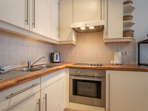 Kitchen Appliance, Countertop, Kitchen, Cabinetry, Major Appliance, Flooring, Interior Design, Wood, Home Appliance, Sink