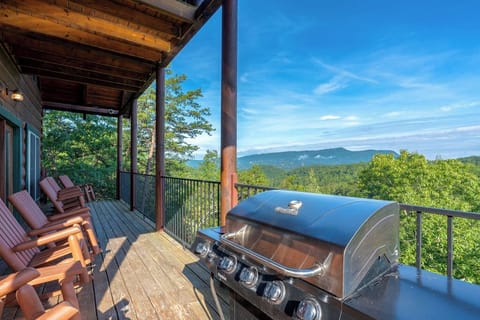Grill and relax in style with a view of the mountains on the main floor deck, with easy access to the kitchen dining and living rooms.