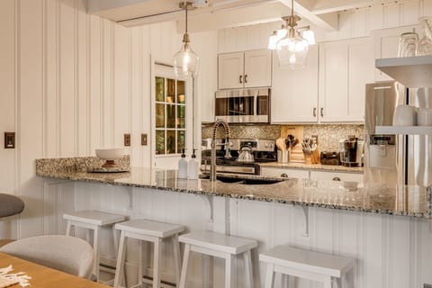 Main Level - Chef's Kitchen w/ Breakfast Bar Seating