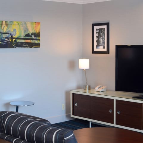 Presidential Suite, 1 King Bed | Living area | Flat-screen TV