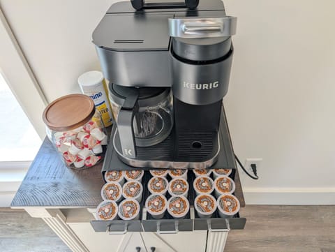 Keurig K-Duo coffee maker.  We provide regular and decaf K-Cups, sugar and creamer pods.