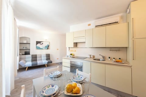 Standard Apartment, Multiple Bedrooms (Charming Apartment Santa Margherita) | Private kitchen | Fridge, oven, stovetop, dishwasher