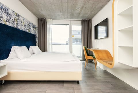 Hypo-allergenic bedding, desk, laptop workspace, free WiFi