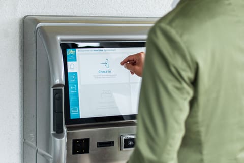 Check-in/check-out kiosk