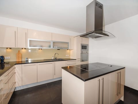 Kitchen, Kitchen Appliance, Countertop, Flooring, Interior Design, Cabinetry, Major Appliance, Wood, Light Fixture, Ceiling