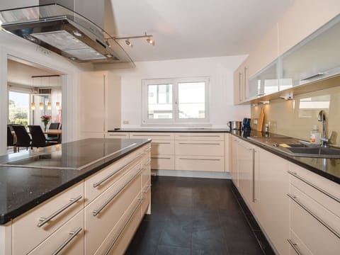 Kitchen, Countertop, Interior Design, Flooring, Wood, Cabinetry, Kitchen Appliance, Lighting, Furniture, Floor