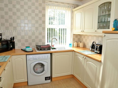 Kitchen, Countertop, Major Appliance, Kitchen Appliance, Interior Design, Cabinetry, Flooring, Plumbing Fixture, Tap, Sink