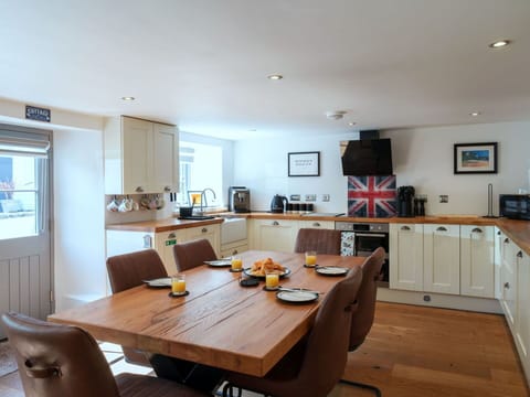 Furniture, Interior Design, Flooring, Wood, Cabinetry, Ceiling, Floor, Kitchen & Dining Room Table, Kitchen, Countertop