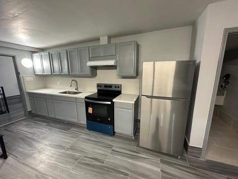 Family Suite, Multiple Beds, Non Smoking | Private kitchen | Full-size fridge, microwave, coffee grinder, paper towels