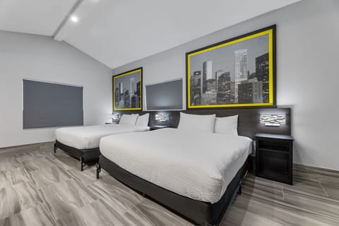 Family Suite, Multiple Beds, Non Smoking | Premium bedding, down comforters, pillowtop beds, desk