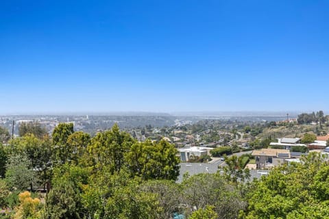 Bird’s eye view of the spacious layout, pool, patios, and prime location