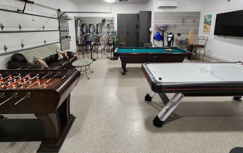 Game room. Bikes are on the back wall.