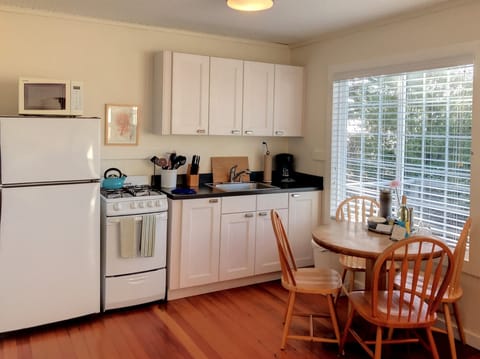 Fuchsia Cottage | Private kitchen | Fridge, microwave, coffee/tea maker, electric kettle