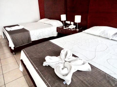 Family Quadruple Room | Individually furnished, desk, iron/ironing board, rollaway beds