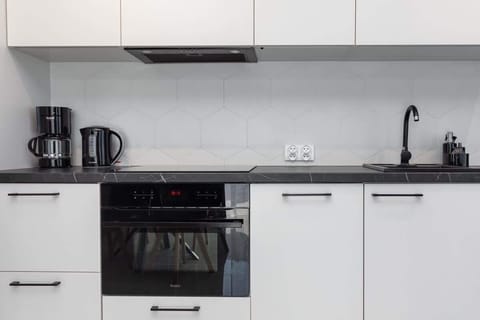 Modern, fully equipped kitchenette.