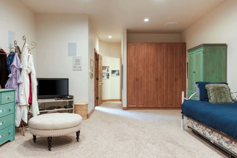 Game room with twin/twin bunk bed, twin day bed with trundle, and twin bed