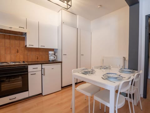 Interior Design, Flooring, Kitchen, Furniture, Floor, Ceiling, Major Appliance, Kitchen Appliance, Room, Countertop