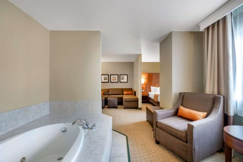 Suite, 1 King Bed, Non Smoking, Hot Tub | In-room safe, blackout drapes, iron/ironing board, rollaway beds