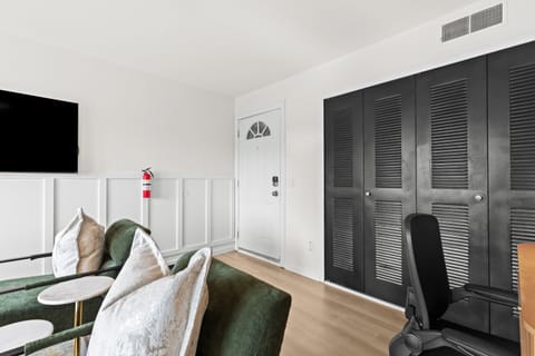 Chic modern decor meets comfort in this tastefully furnished living area.