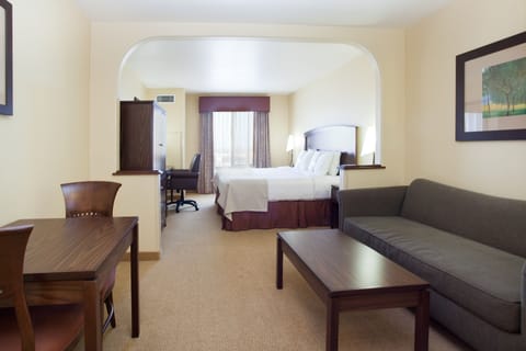 Suite, 1 King Bed (Additional Living and Dining Area) | Hypo-allergenic bedding, in-room safe, desk, blackout drapes