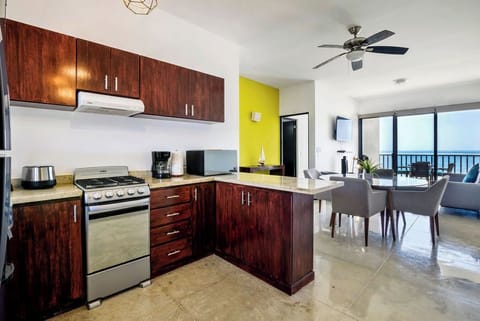 Apartment, 2 Bedrooms, Ocean View | Private kitchen | Full-size fridge, microwave, oven, stovetop