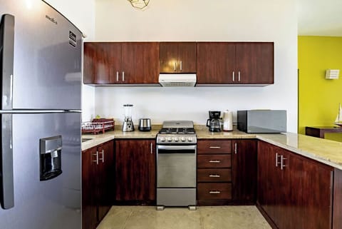 Apartment, 2 Bedrooms, Ocean View | Private kitchen | Full-size fridge, microwave, oven, stovetop