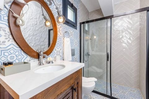 Deluxe Room, Patio, Pool View | Bathroom | Shower, hair dryer, towels, soap