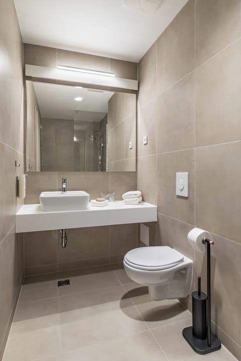 Shower, free toiletries, hair dryer, bathrobes