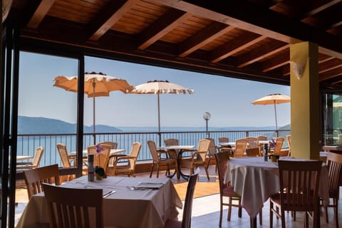 Breakfast, lunch, dinner served; local cuisine