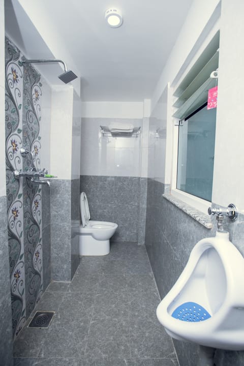 Standard Single Room | Bathroom | Shower, bathrobes, slippers, bidet