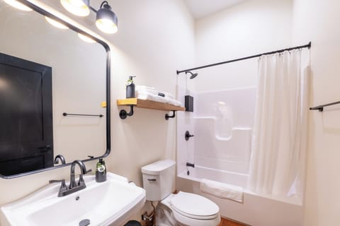 Hair dryer, towels, soap, shampoo