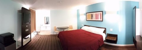 Standard Room, 1 King Bed, Non Smoking | Desk, iron/ironing board, free WiFi, bed sheets