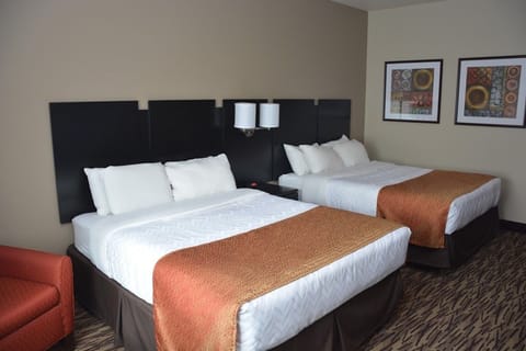Luxury Room, 2 Queen Beds | Premium bedding, desk, iron/ironing board, free cribs/infant beds