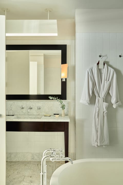 Loft Studio | Bathroom | Separate tub and shower, jetted tub, hydromassage showerhead, hair dryer