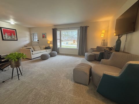 Spacious main living room with seating for groups