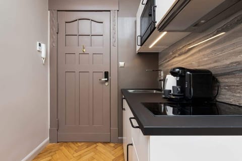 The kitchenette's practical layout maximizes space and functionality.