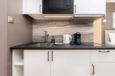 The kitchenette is equipped with all the essentials for cooking delicious meals.