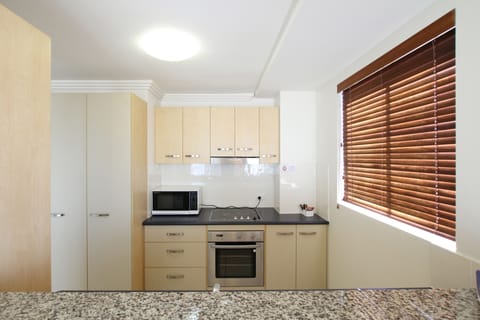 One Bedroom Apartment | Private kitchen | Fridge, microwave, electric kettle, toaster