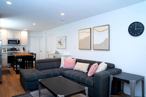 Living room with a comfortable couch, and a Smart TV