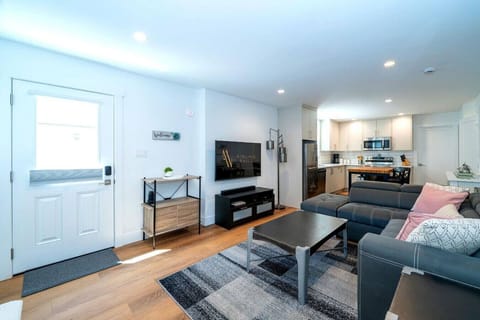 Living room with a comfortable couch, and a Smart TV