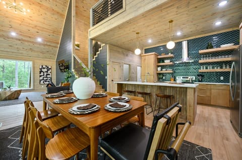 Cooking, dining, and bonding—all in one welcoming space. Our fully stocked kitchen flows into the dining area, complete with a high chair so even your tiniest traveler has a seat at the table!