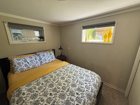 Bedroom 4: Bright queen corner bedroom with closet.
