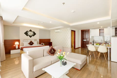 Apartment, 1 Bedroom, Sea View (No Balcony) | Living room | 32-inch flat-screen TV with cable channels, TV, books