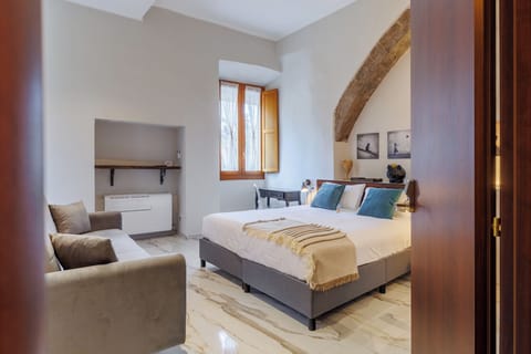 Luxury Triple Room, City View | Desk, laptop workspace, free WiFi