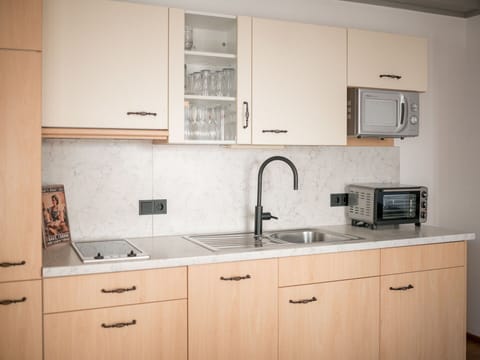 Countertop, Cabinetry, Kitchen, Kitchen Sink, Sink, Kitchen Appliance, Wood, Furniture, Plumbing Fixture, Major Appliance