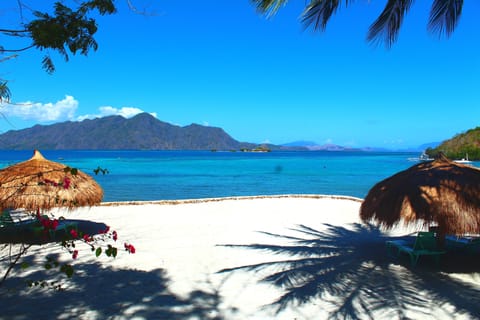 Private beach, sun loungers, beach umbrellas, beach towels