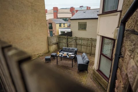 Relax on the spacious private terrace and patio, perfect for outdoor dining and unwinding in comfort.