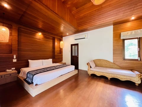 Family Room, 2 Bedrooms, Sea View | Minibar, in-room safe, individually decorated, individually furnished