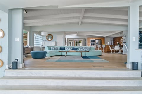 A view of the main open space in the house from the sunroom on the beachfront.