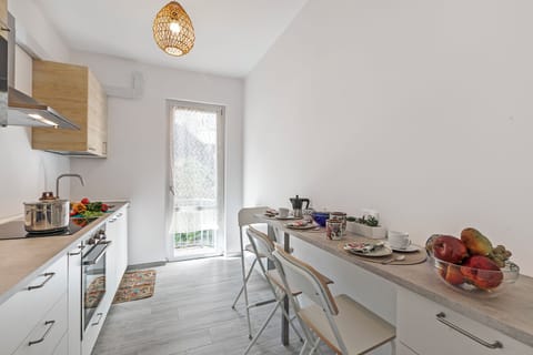 Family Apartment, Multiple Bedrooms, Beachside (Incanto Del Lago 50 Meters From Lake) | Private kitchen | Fridge, microwave, oven, stovetop